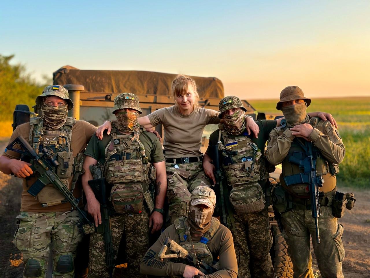 Helena Maksyom with soldiers of her brigade at sunset